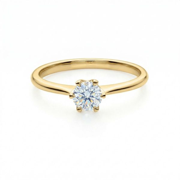 	Diamantring forlovelsesring 0,40 ct i 14kt gult gull. Aida -180160400